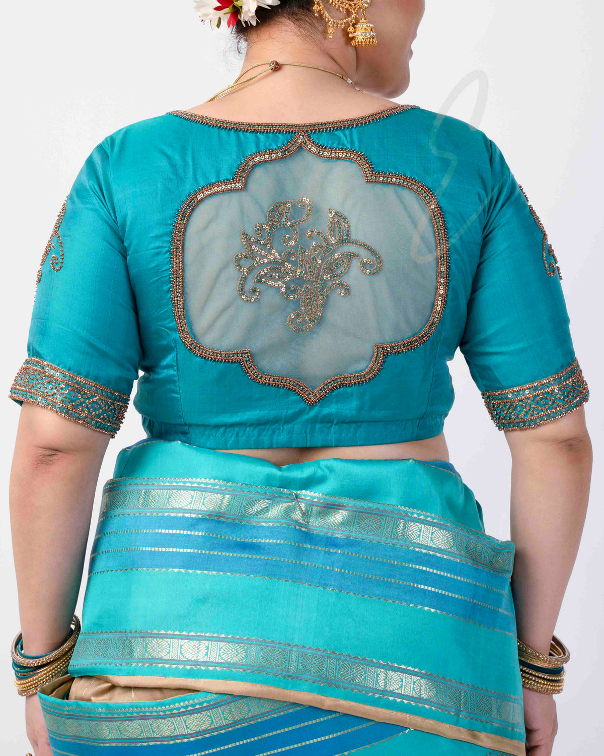 A blue silk cotton net blouse