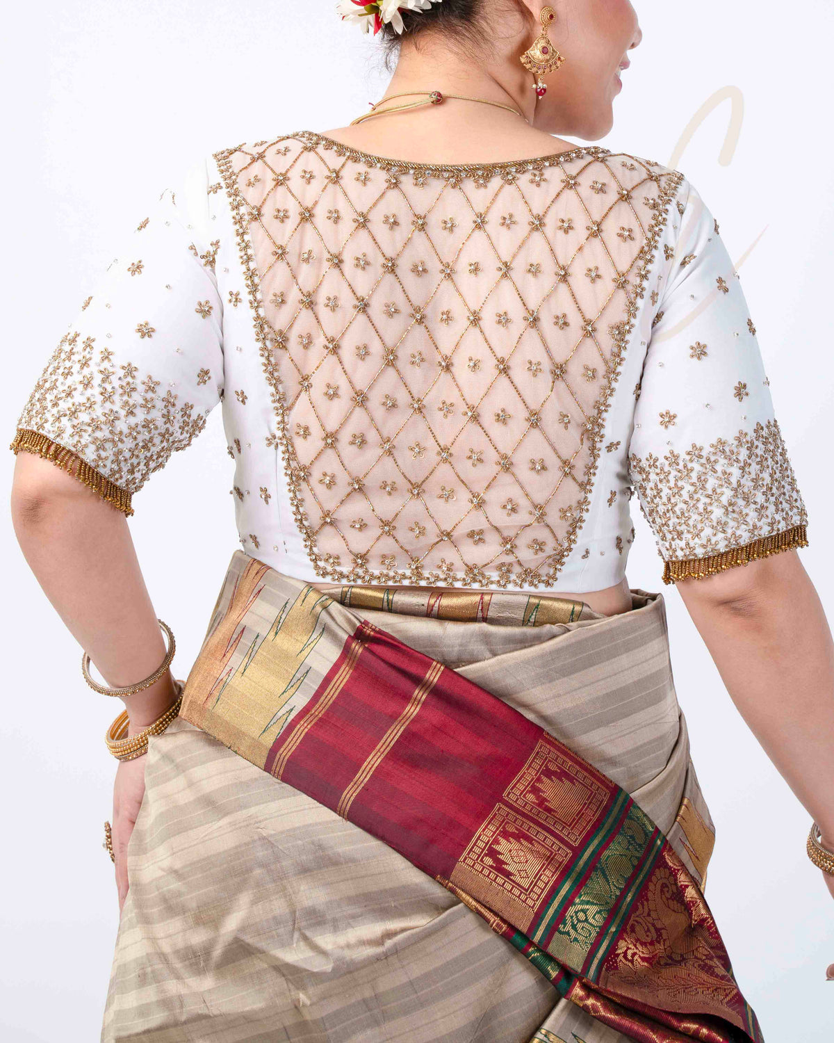 A half white georgette with net blouse
