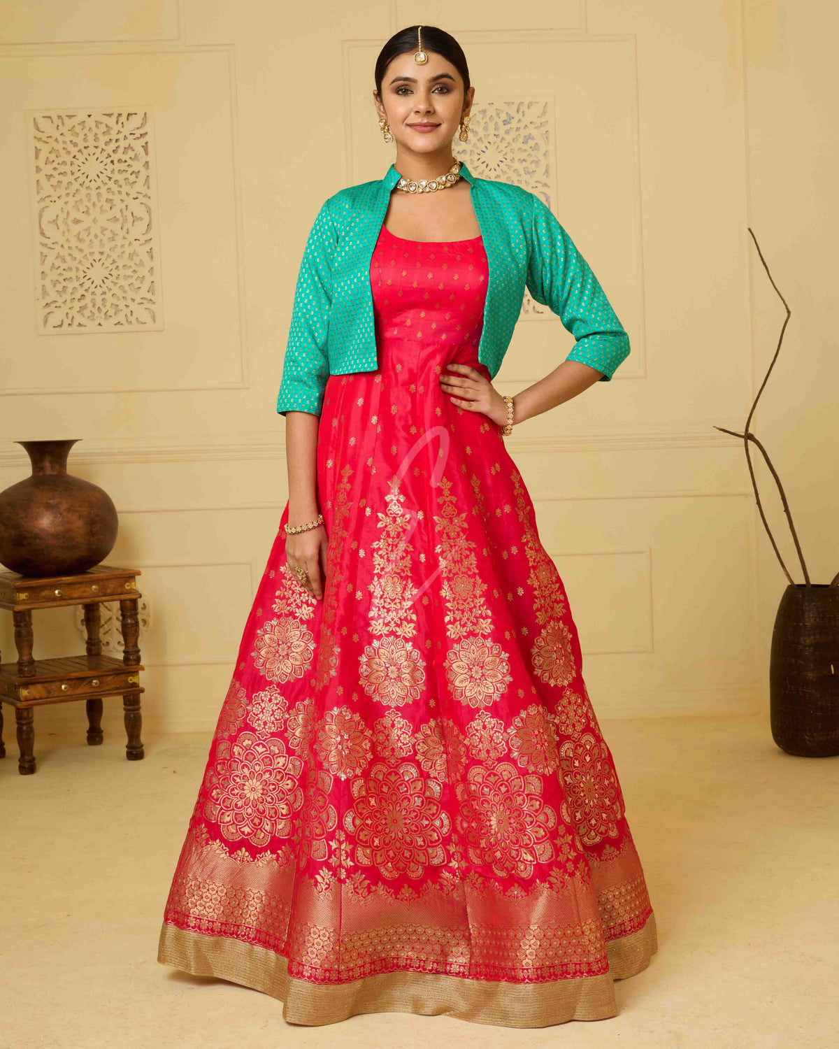 A deep pink Banarasi silk gown