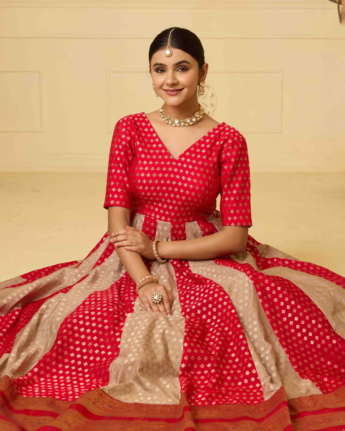A striking red Banarasi silk gown