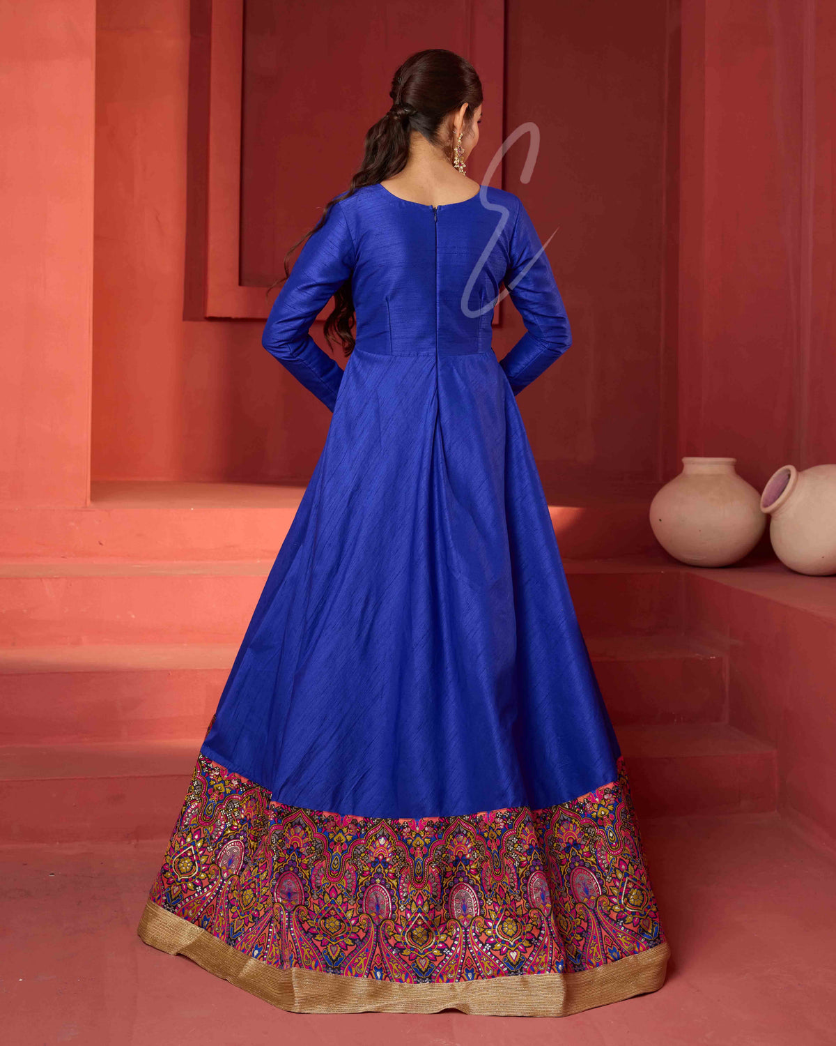 A dark blue raw silk gown