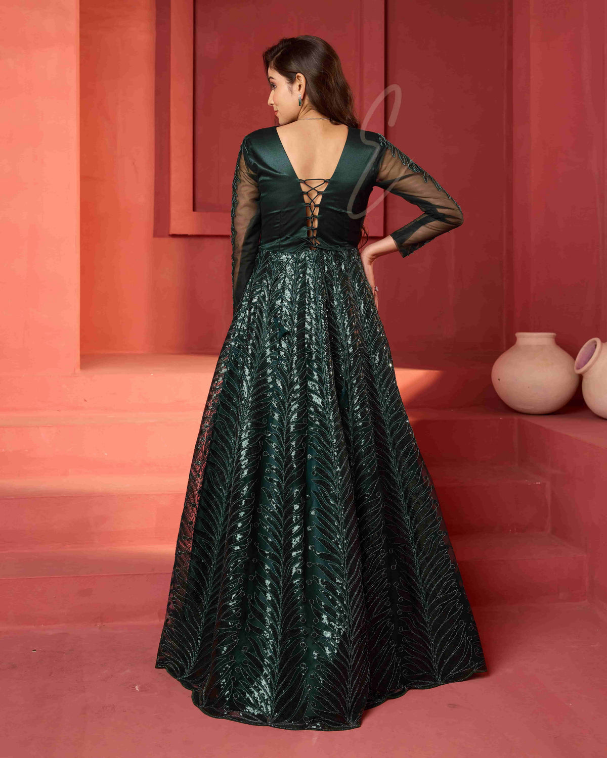 A dark green premium net gown