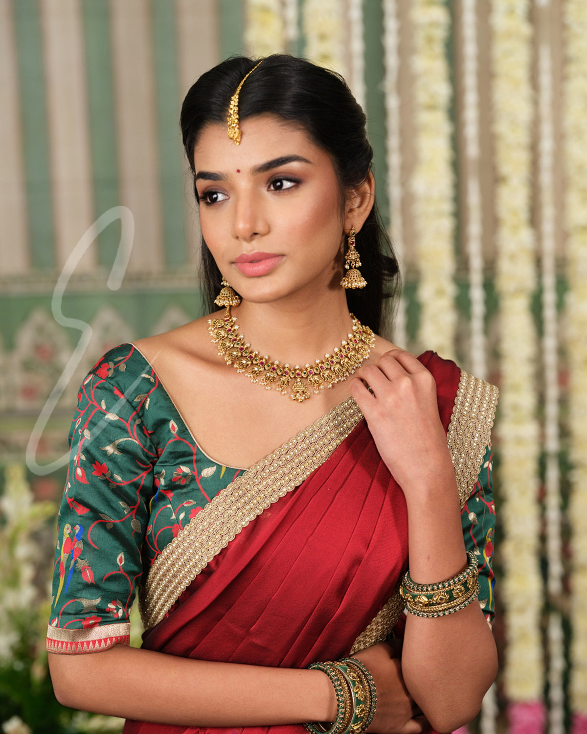Rich dark green Banarasi silk half saree with intricate maroon jari