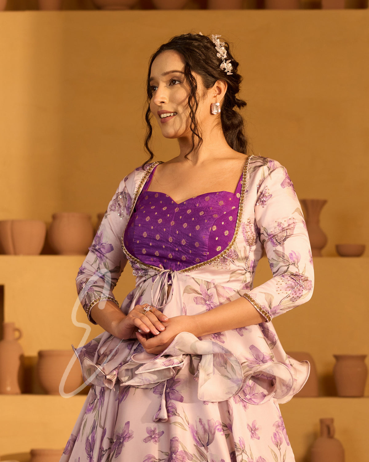 A lavender georgette satin skirt paired with a violet Banarasi silk blouse