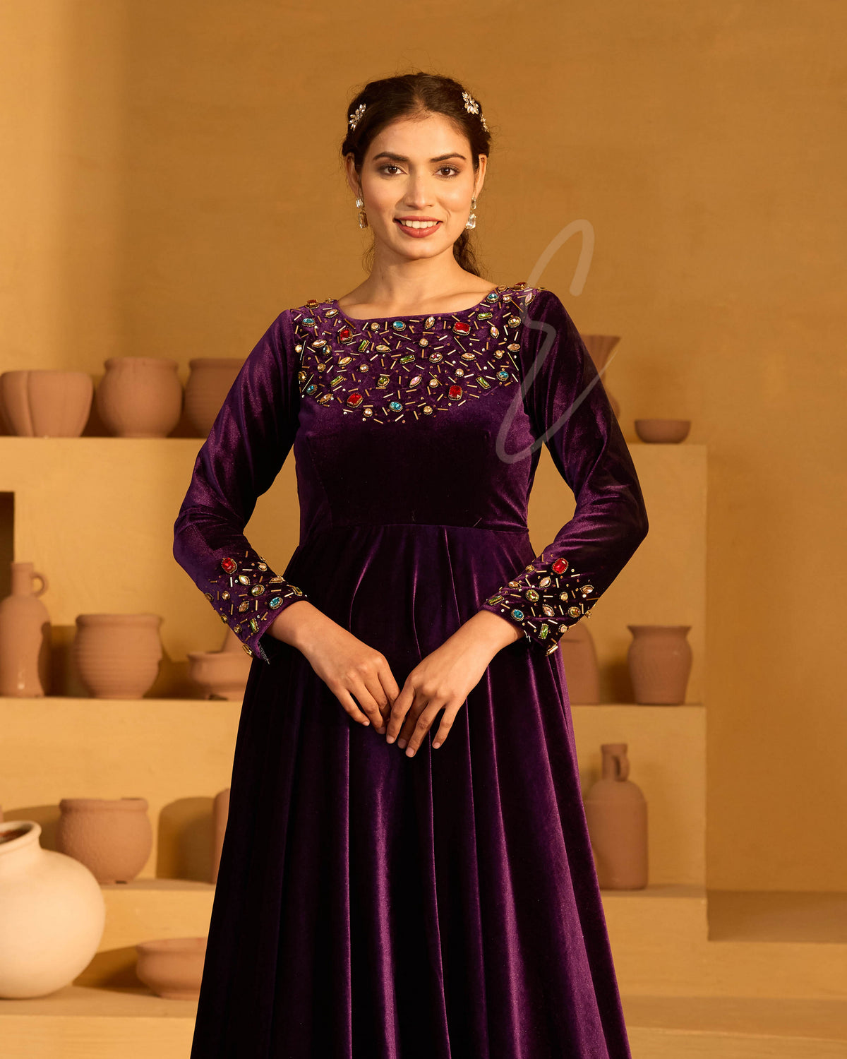 A deep violet velvet gown
