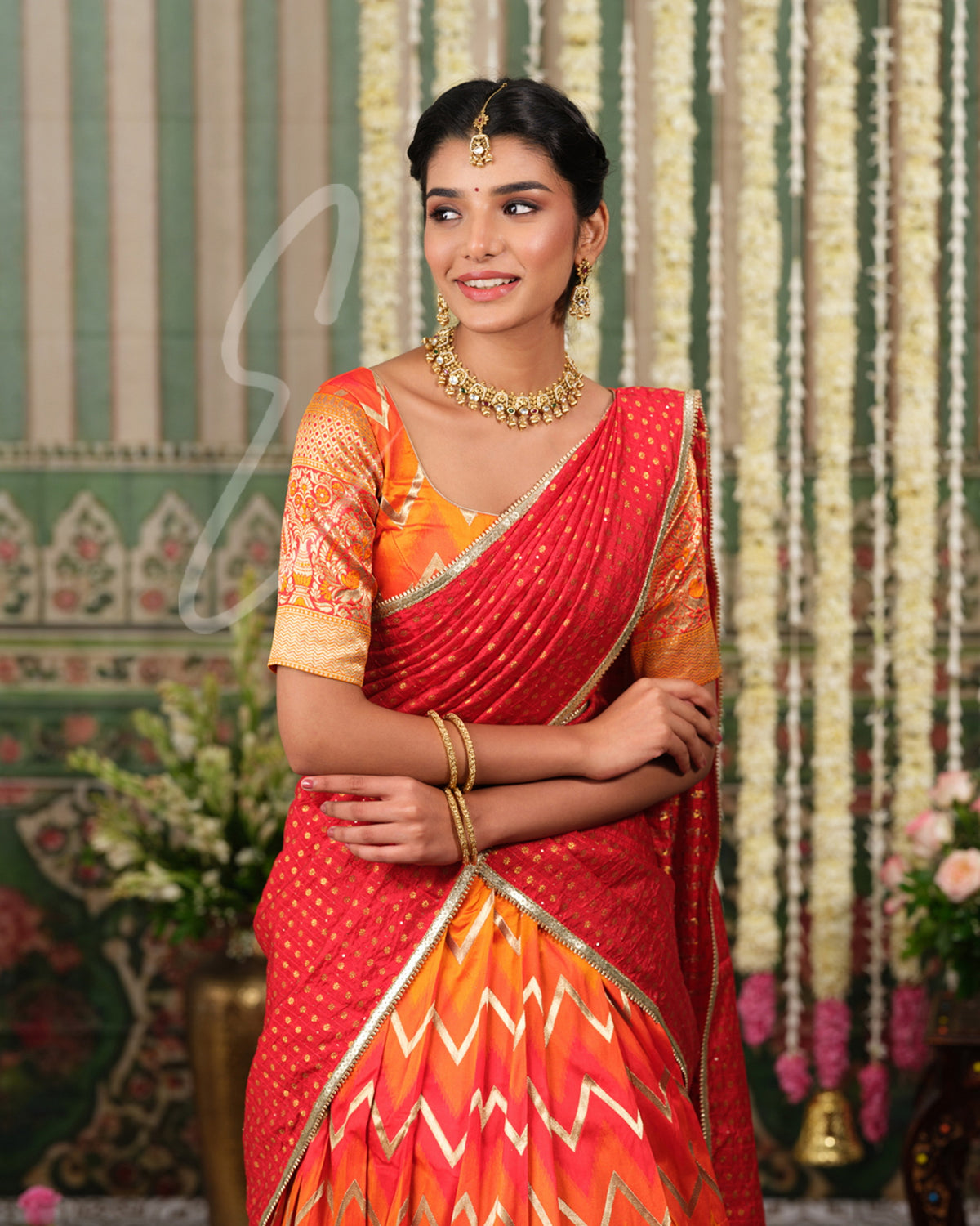 Red and orange Banarasi silk half saree with intricate woven detailing