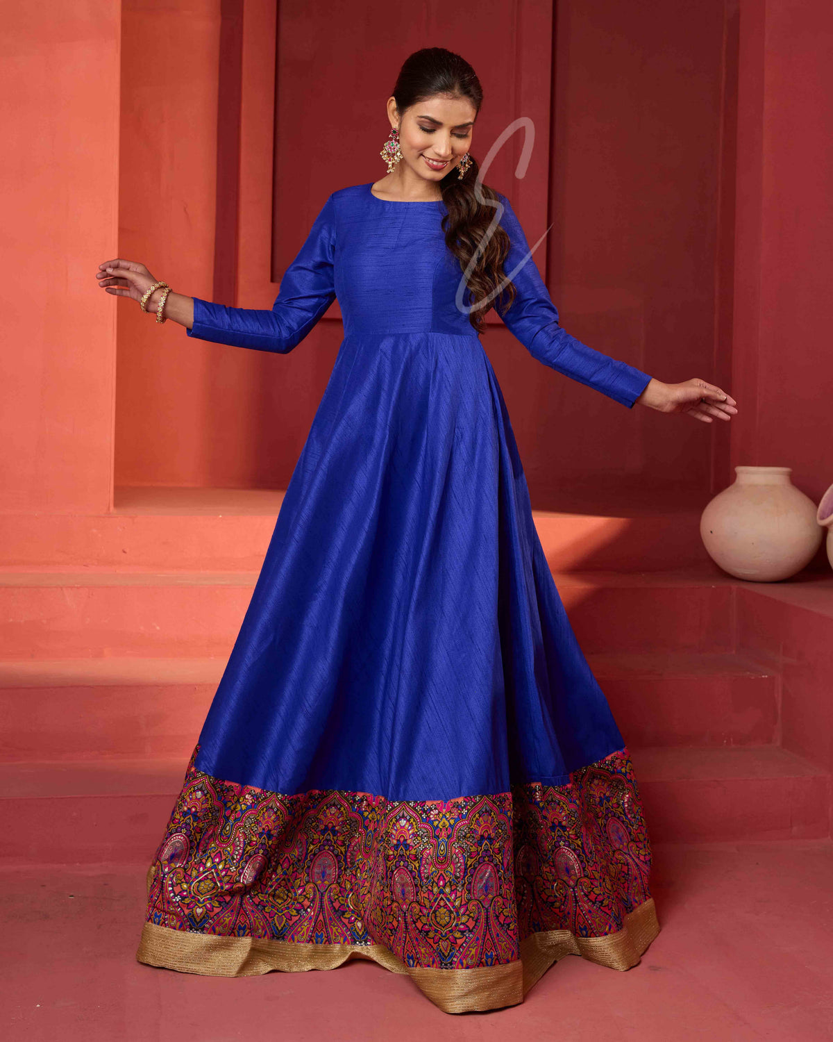 A dark blue raw silk gown