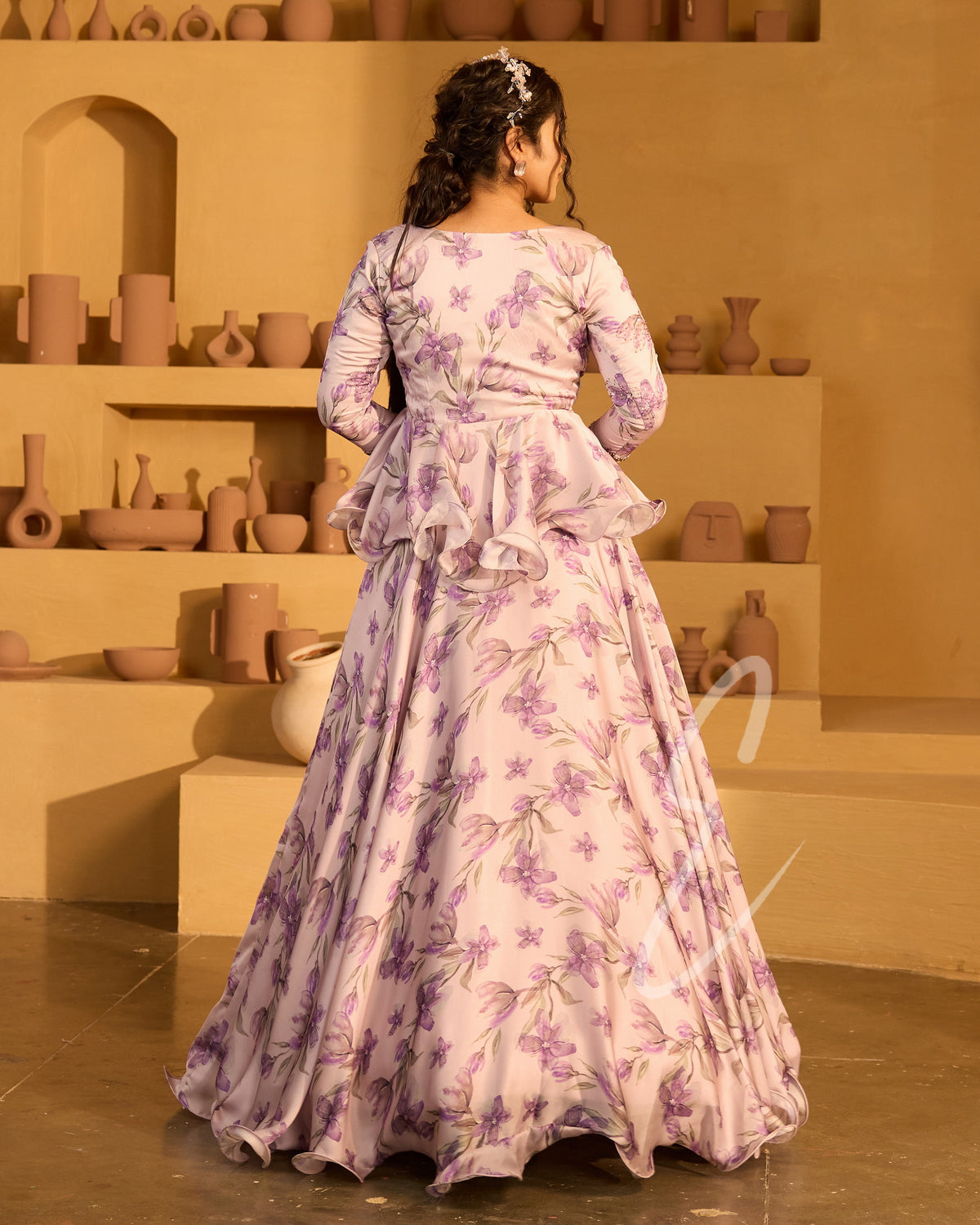 A lavender georgette satin skirt paired with a violet Banarasi silk blouse