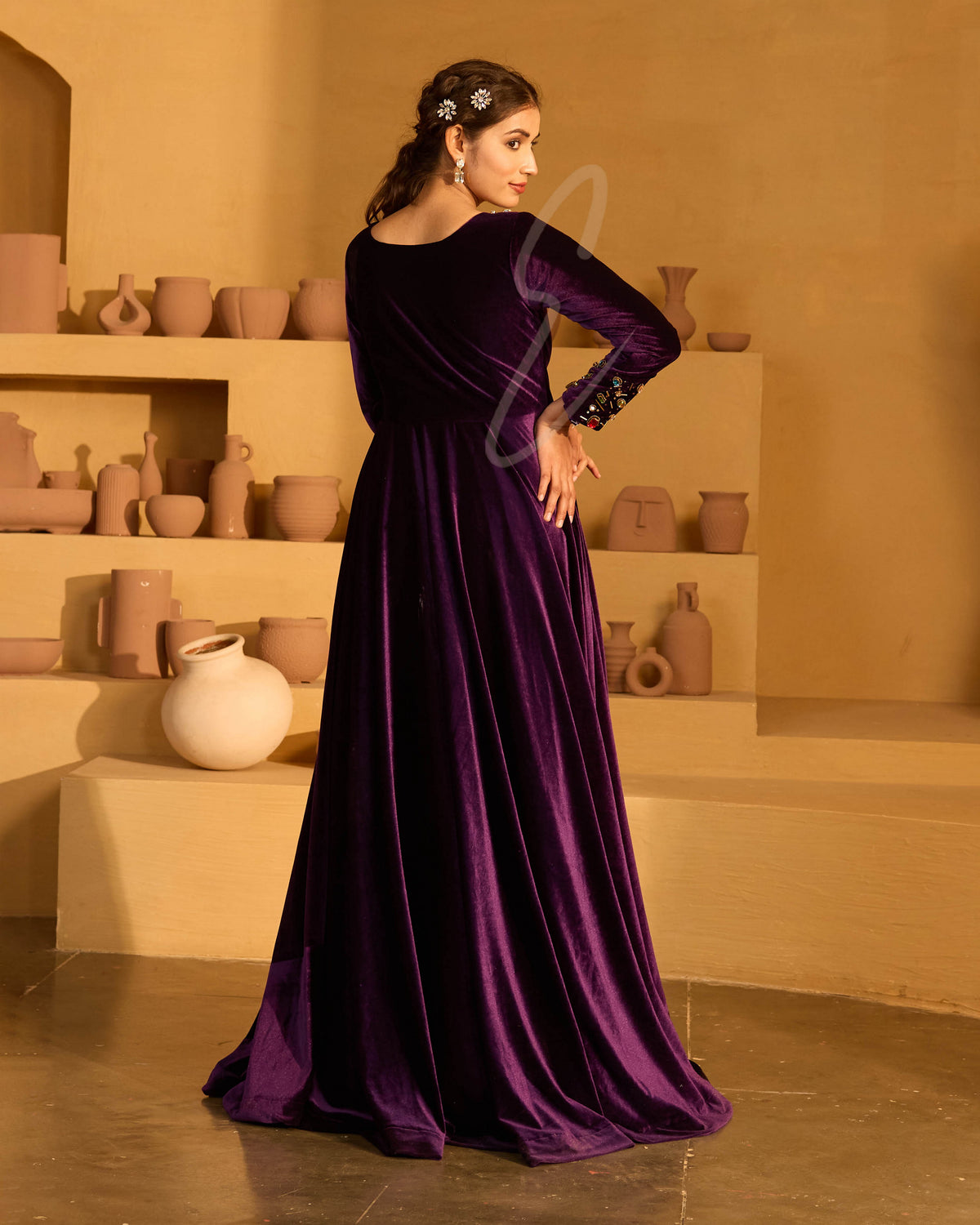 A deep violet velvet gown