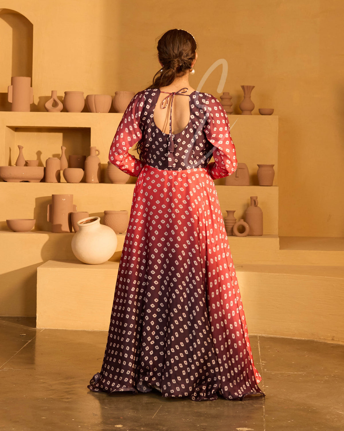 A red and dark brown satin georgette gown
