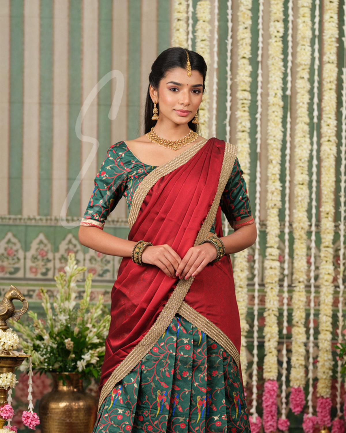 Rich dark green Banarasi silk half saree with intricate maroon jari