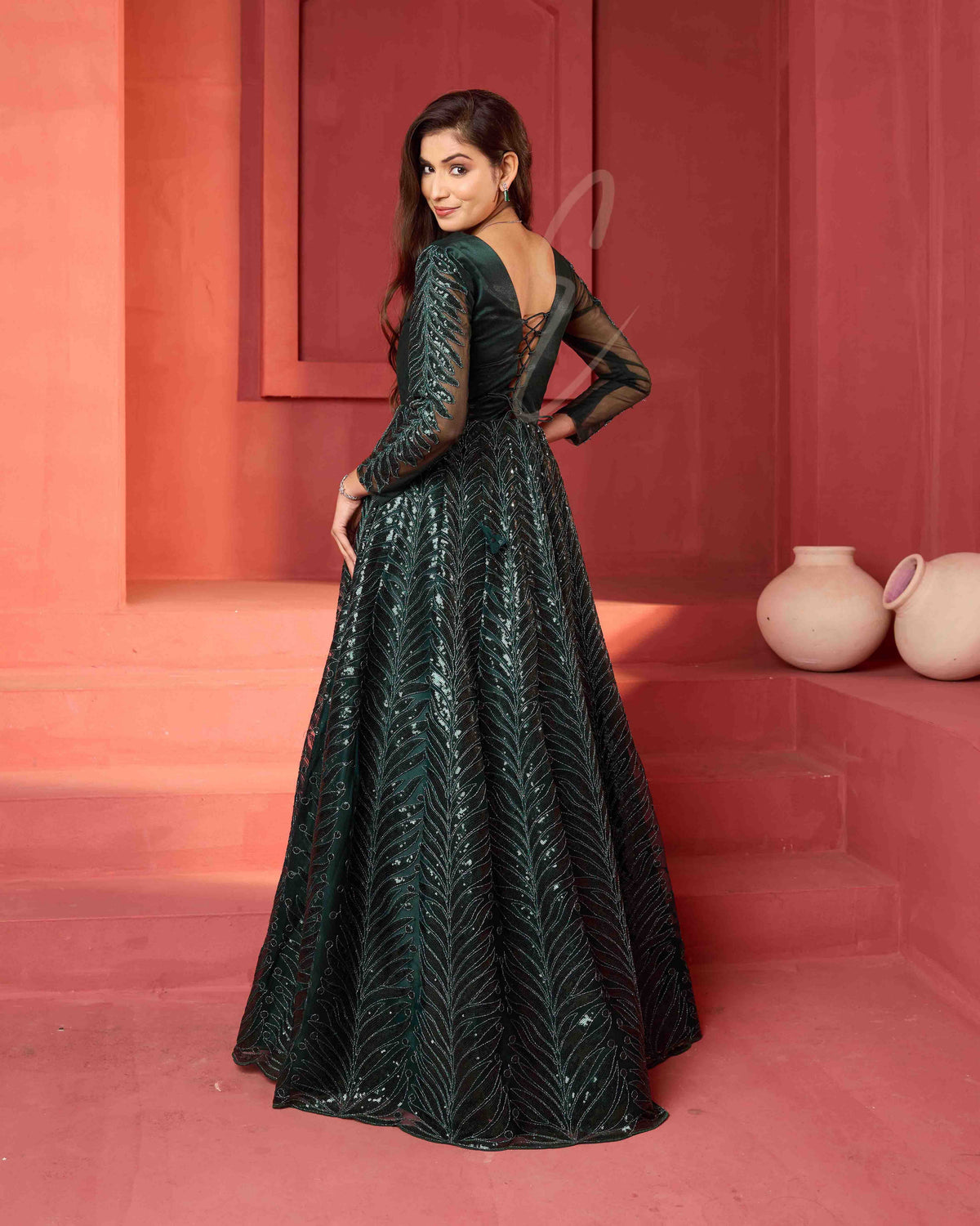A dark green premium net gown