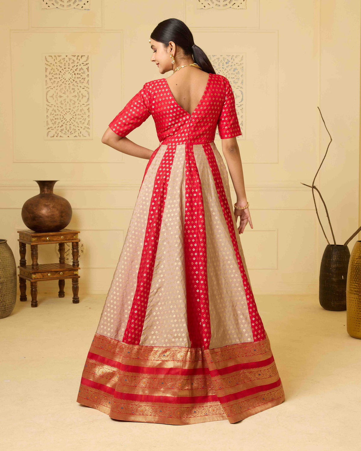 A striking red Banarasi silk gown