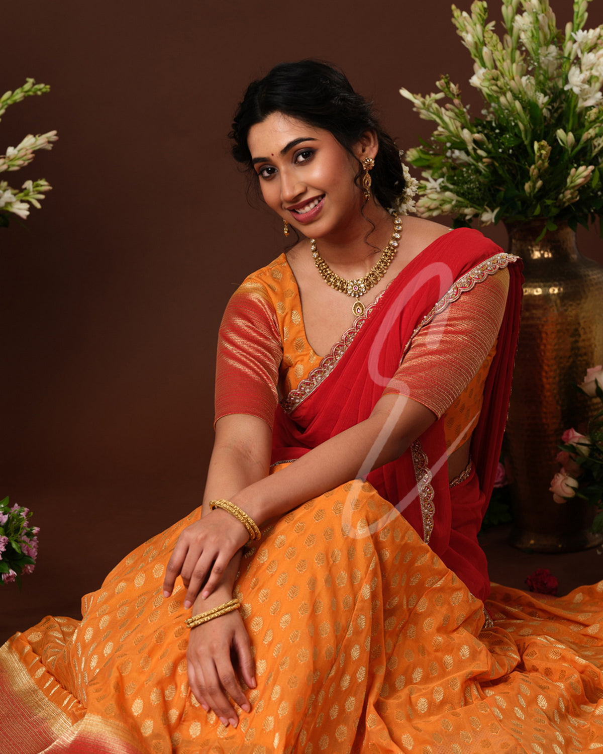 Vibrant orange and red Banarasi Georgette outfit
