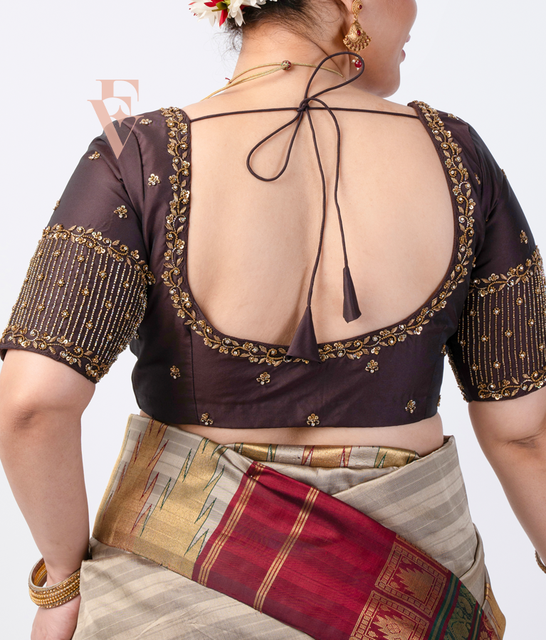 A brown silk cotton blouse designed
