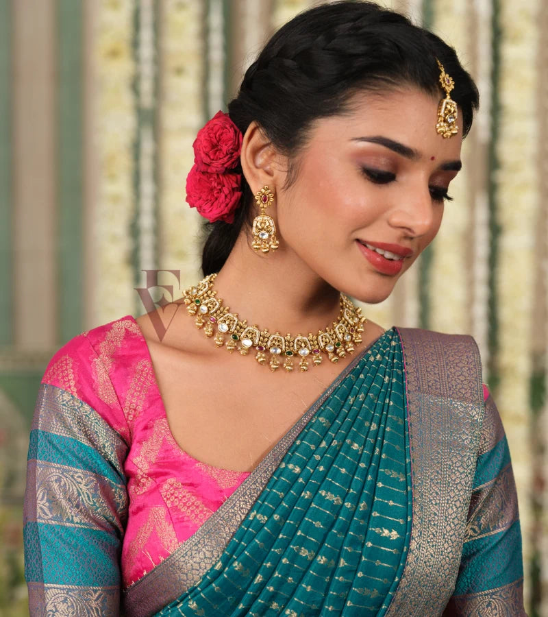 A beautiful pink and rama green silk cotton outfit that looks rich and elegant