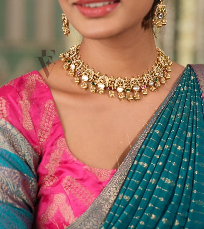 A beautiful pink and rama green silk cotton outfit that looks rich and elegant