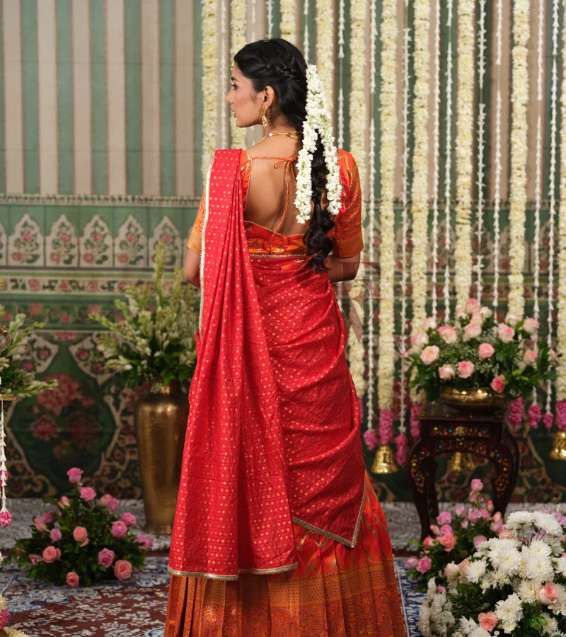 Red and orange Banarasi silk half saree with intricate woven detailing