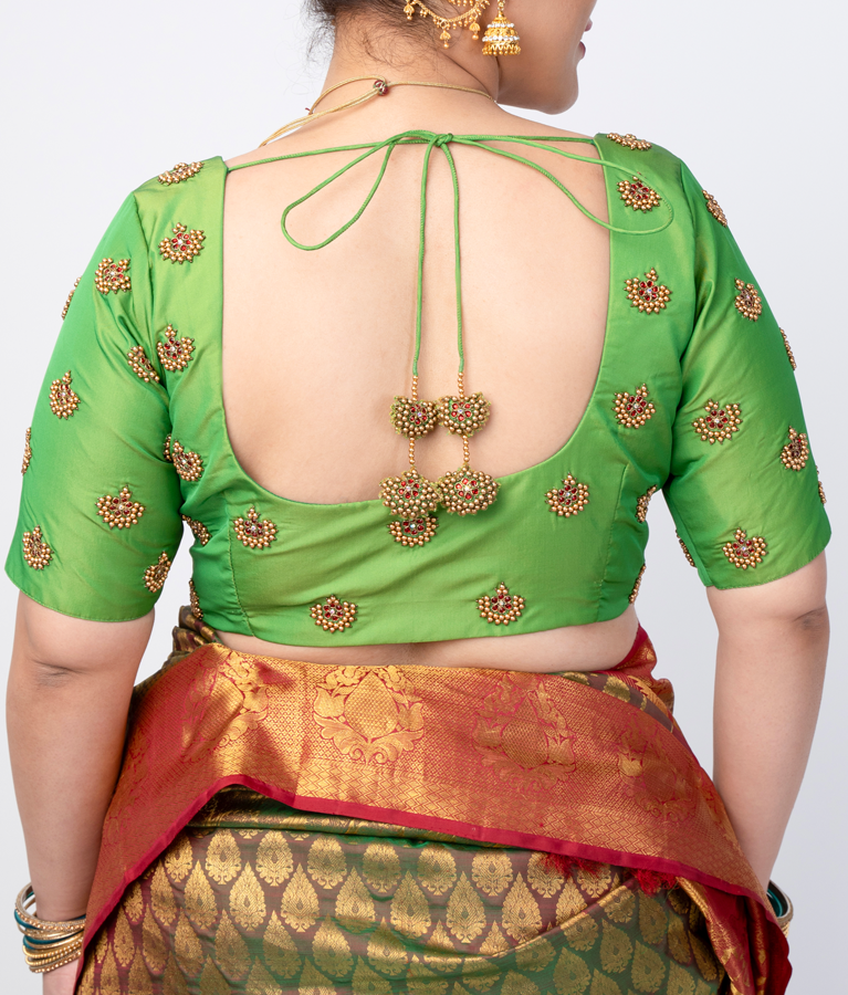 green silk cotton blouse designed in a princess-cut style