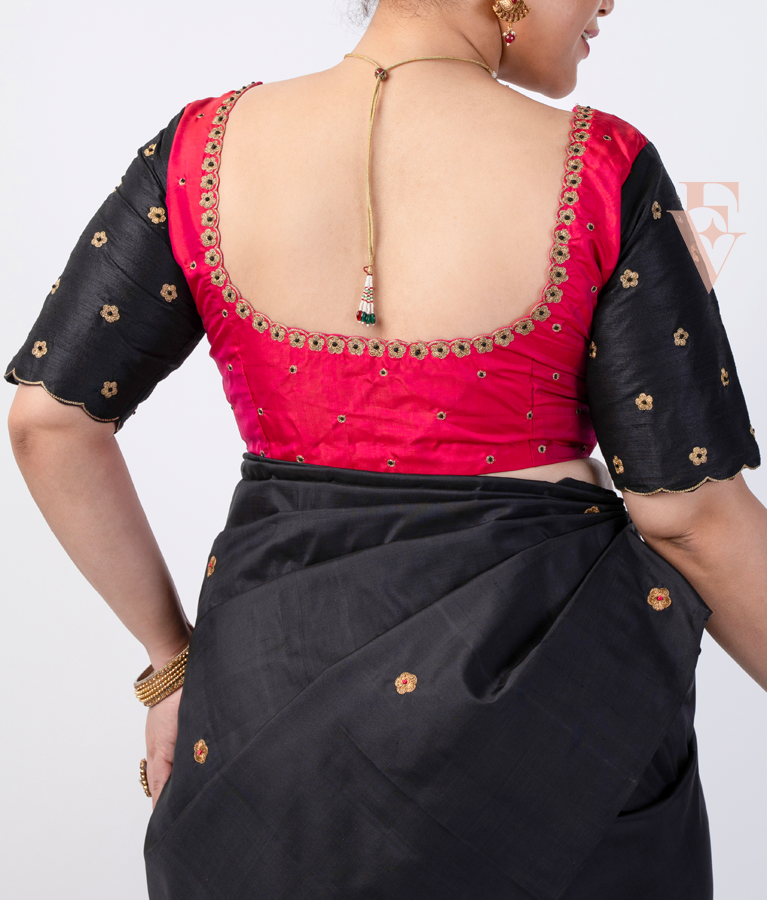A pink and black raw silk blouse designed in a princess-cut style EB0002