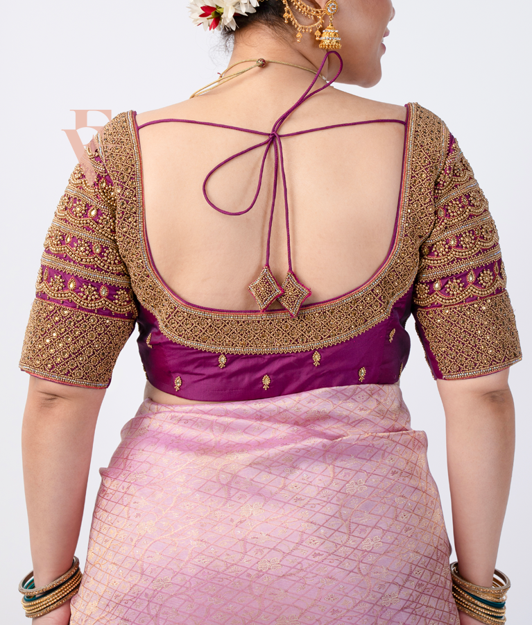 A magenta silk cotton blouse designed