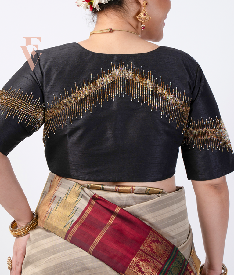 black raw silk blouse designed in a princess-cut style