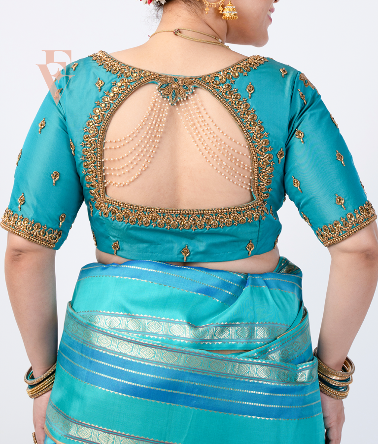 A Rama blue silk cotton blouse designed