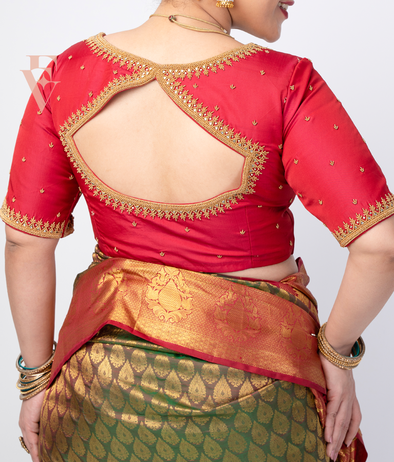 reddish pink silk cotton blouse designed in a princess-cut style