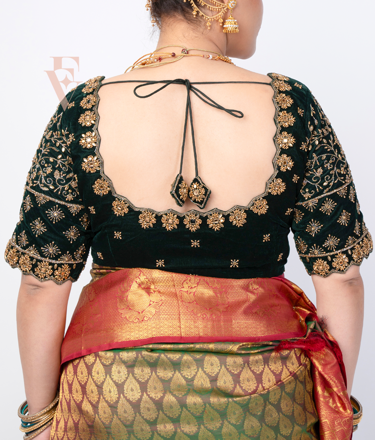 A dark green premium velvet blouse