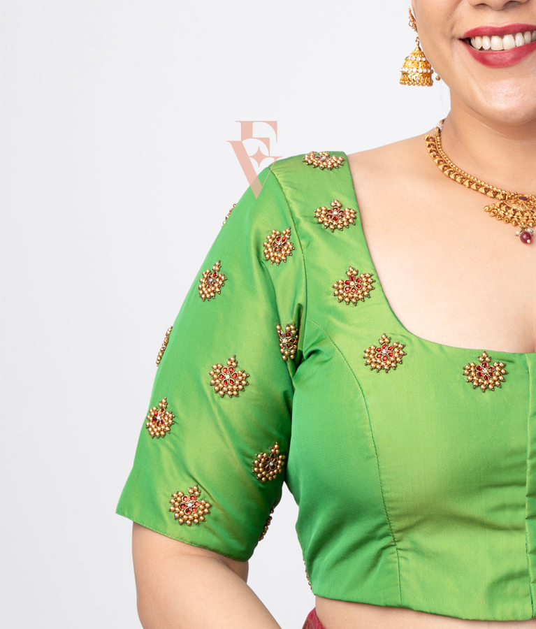 green silk cotton blouse designed in a princess-cut style