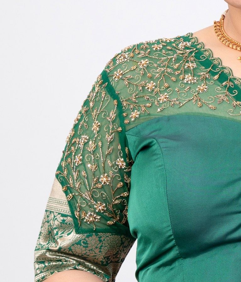 A green silk cotton with net blouse