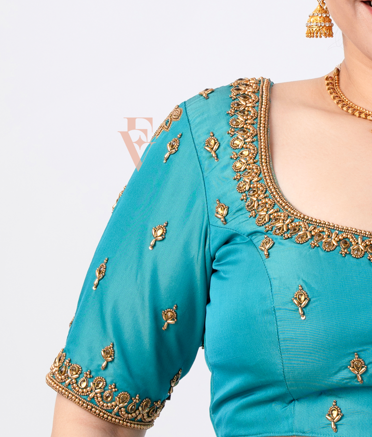 A Rama blue silk cotton blouse designed