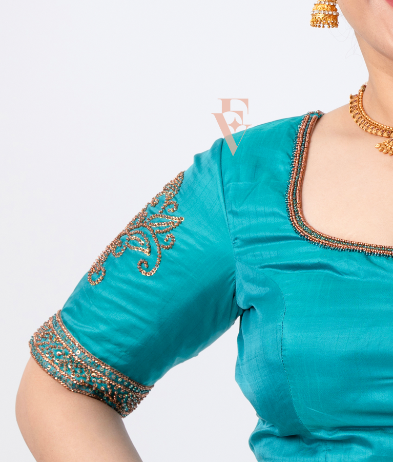 A blue silk cotton net blouse