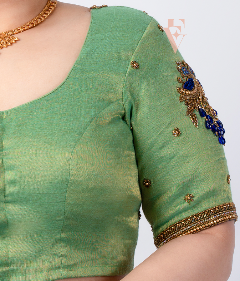 A parrot green tissue silk blouse