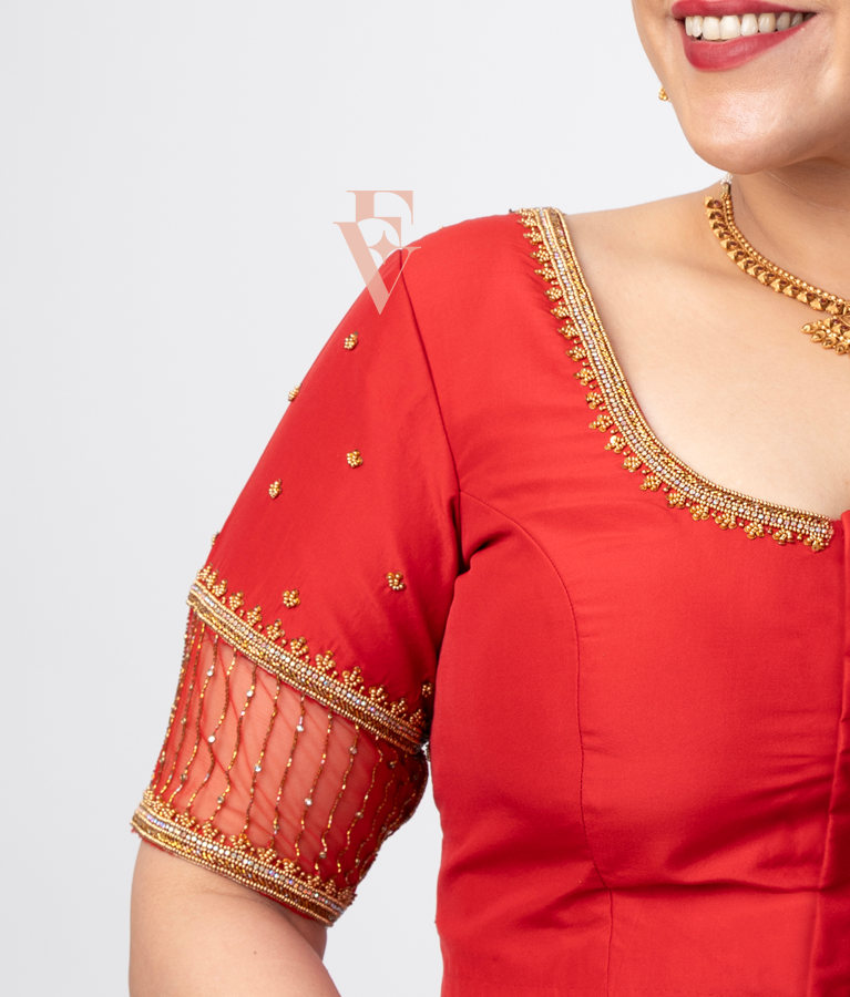 A red silk cotton net blouse designed