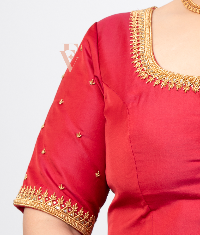 reddish pink silk cotton blouse designed in a princess-cut style