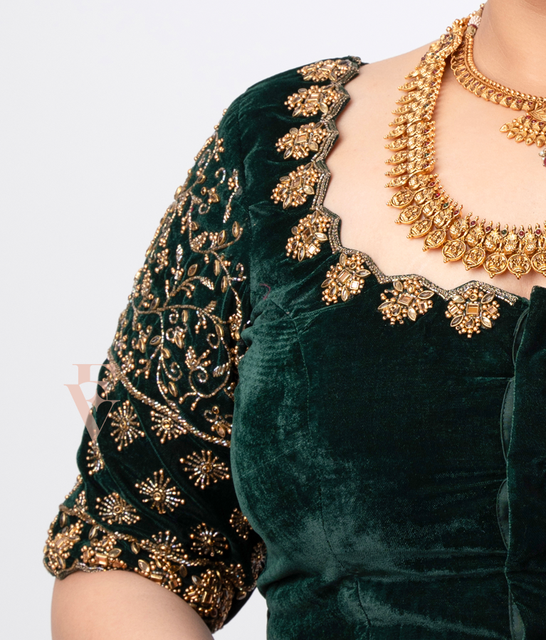 A dark green premium velvet blouse