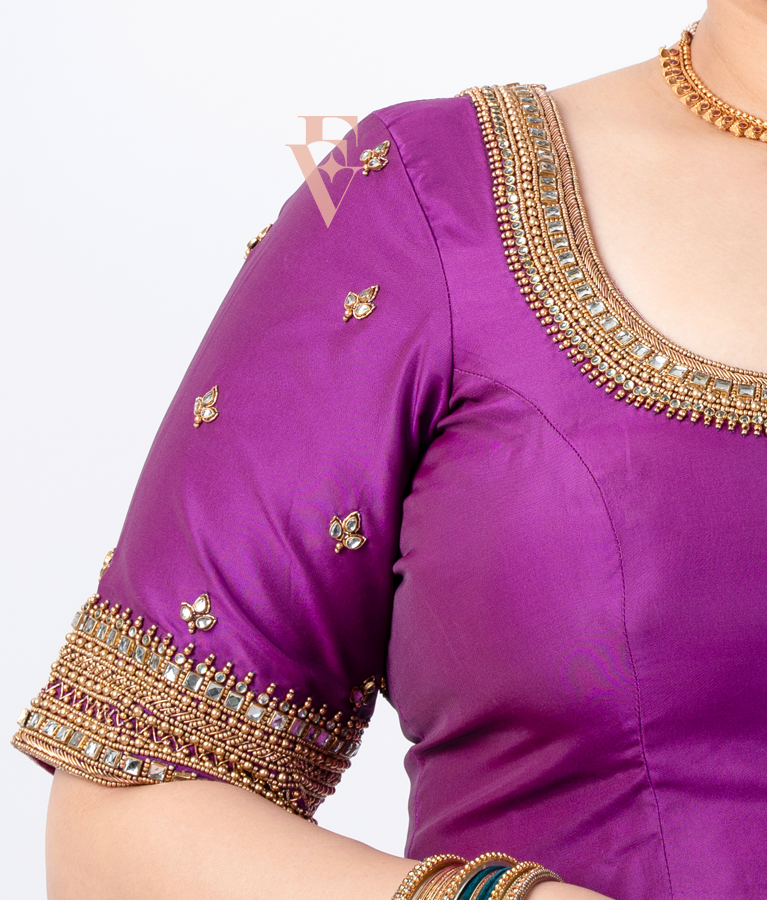 A purple silk cotton blouse designed