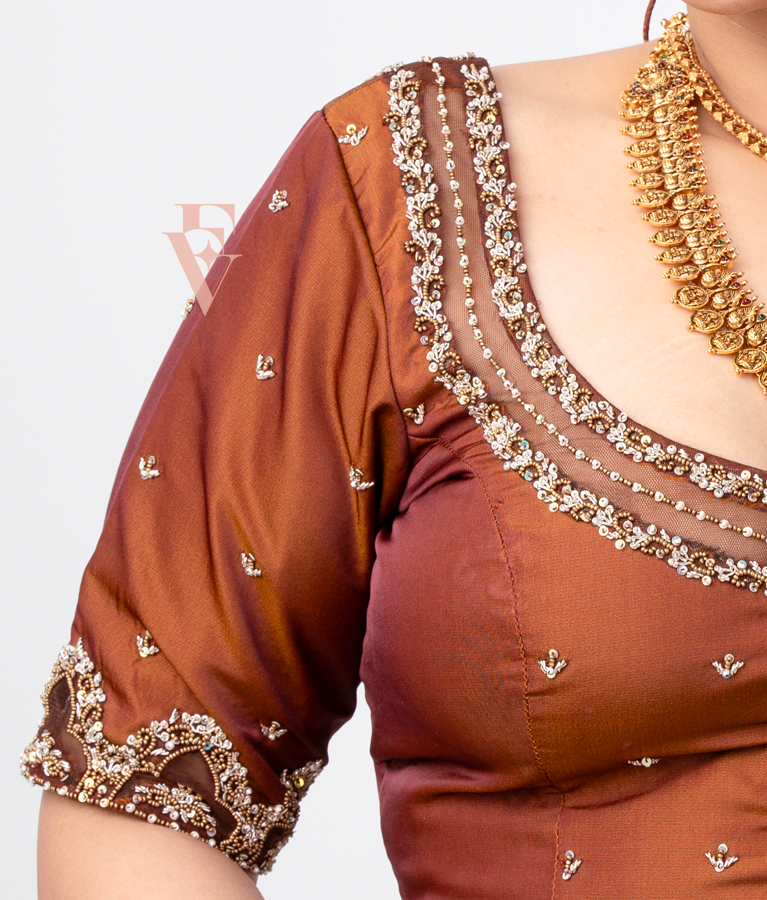 A brown silk cotton with net blouse