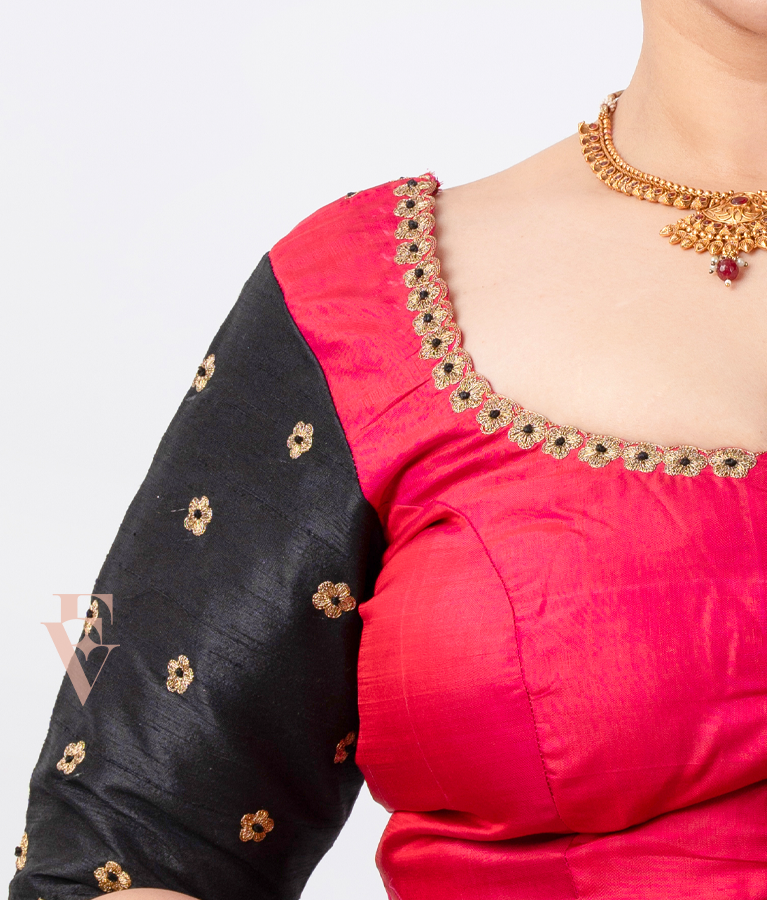 A pink and black raw silk blouse designed in a princess-cut style EB0002