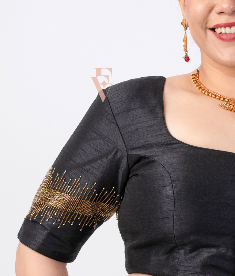 black raw silk blouse designed in a princess-cut style