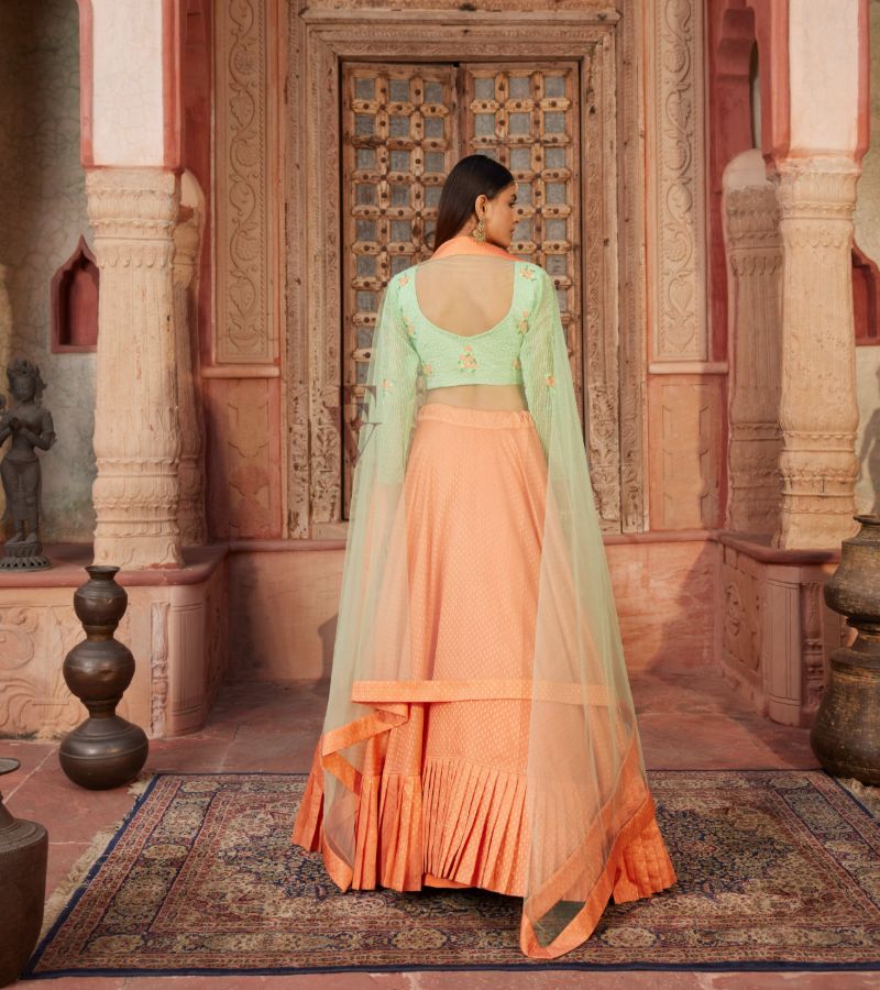 Peachy-orange Lehenga