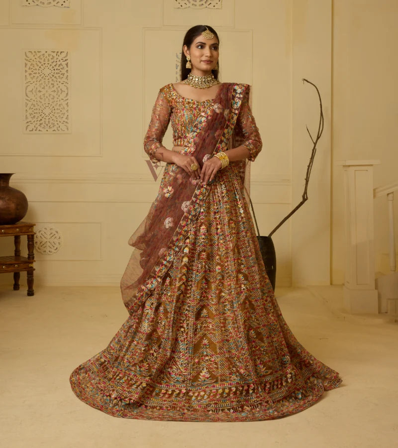 This is an exquisite mustard brown lehenga