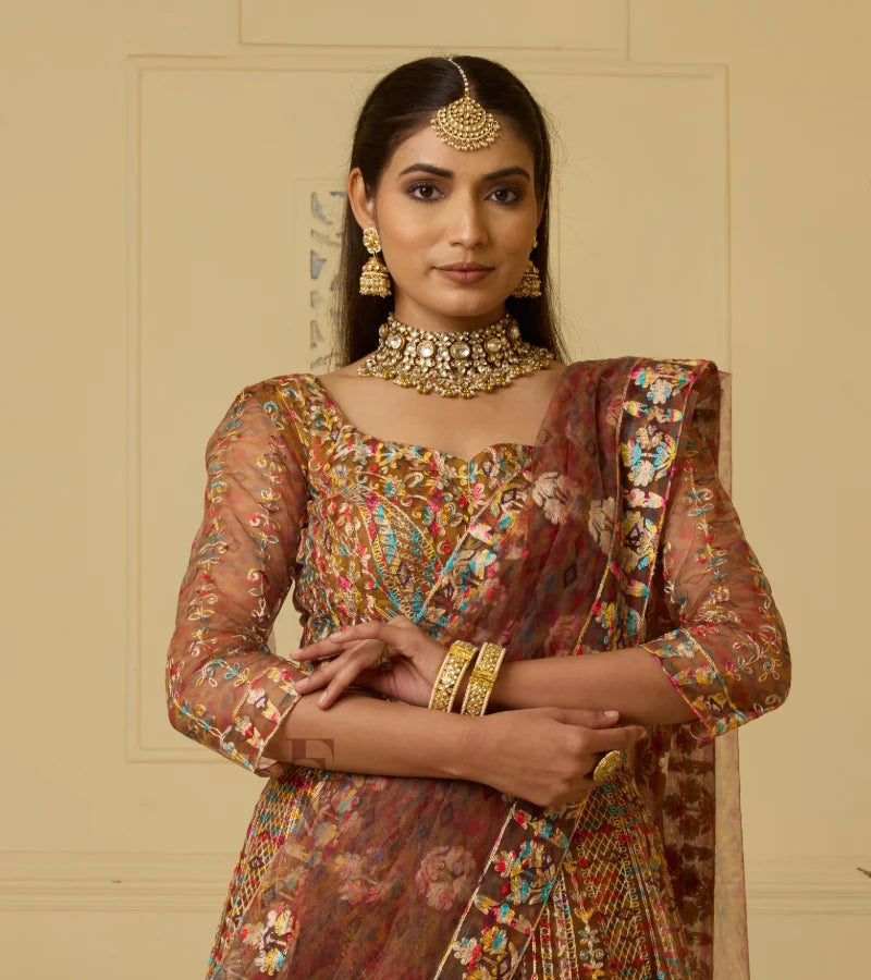 This is an exquisite mustard brown lehenga