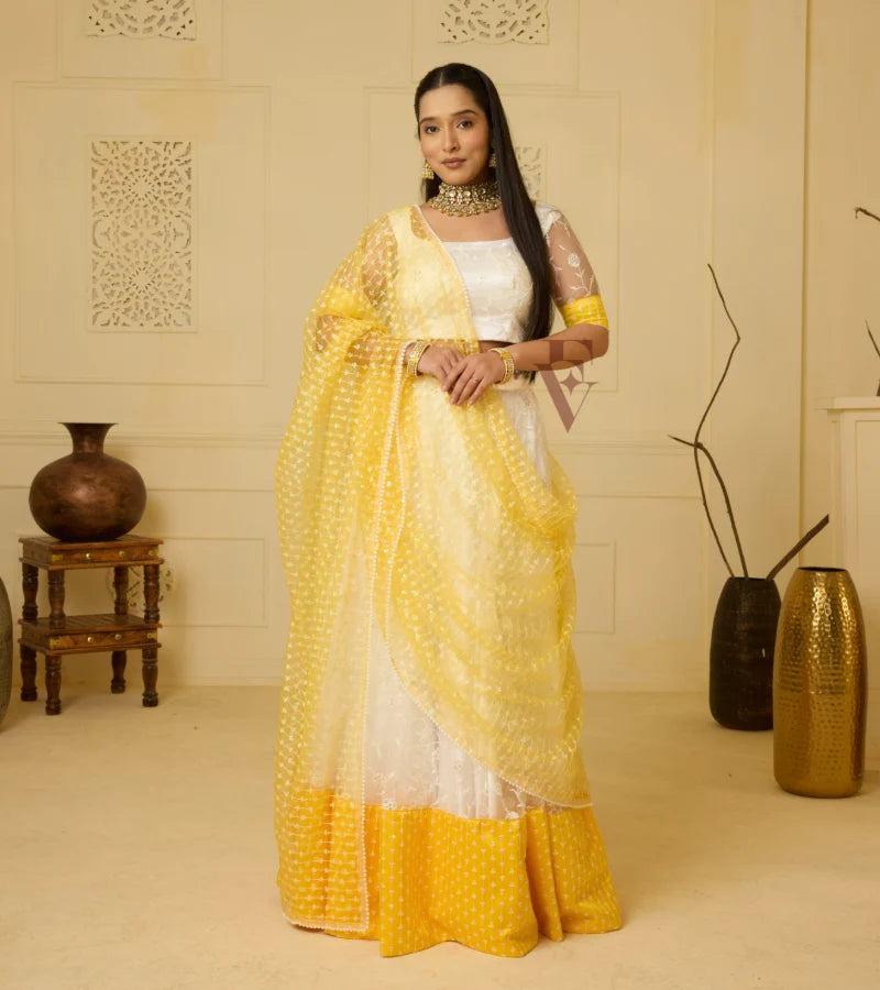 An elegant white and yellow lehenga