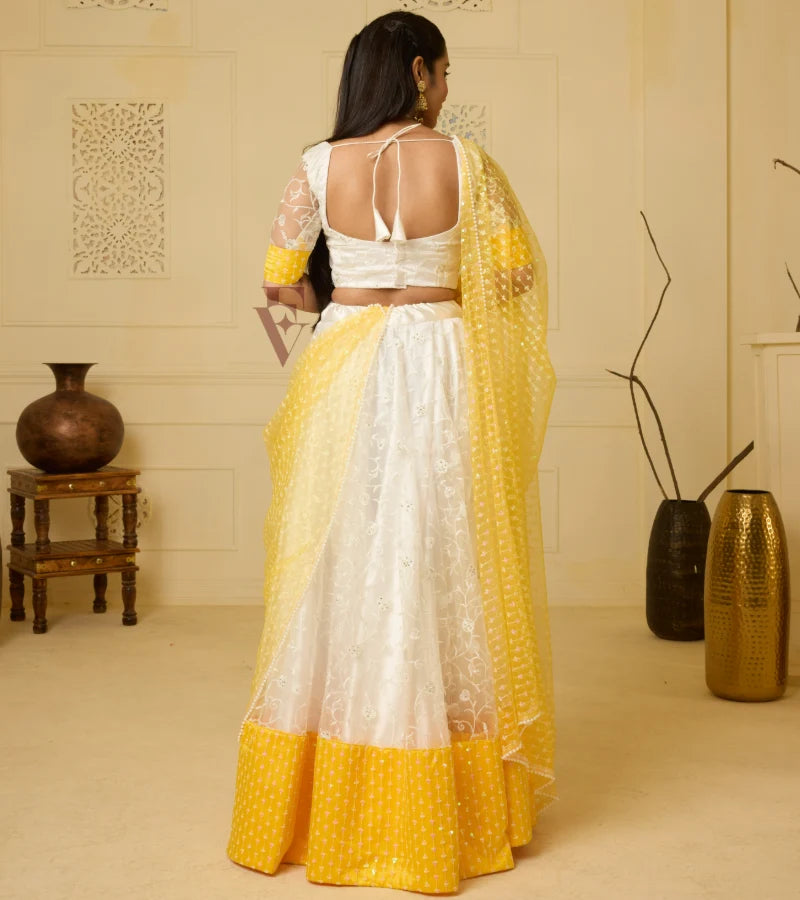 An elegant white and yellow lehenga