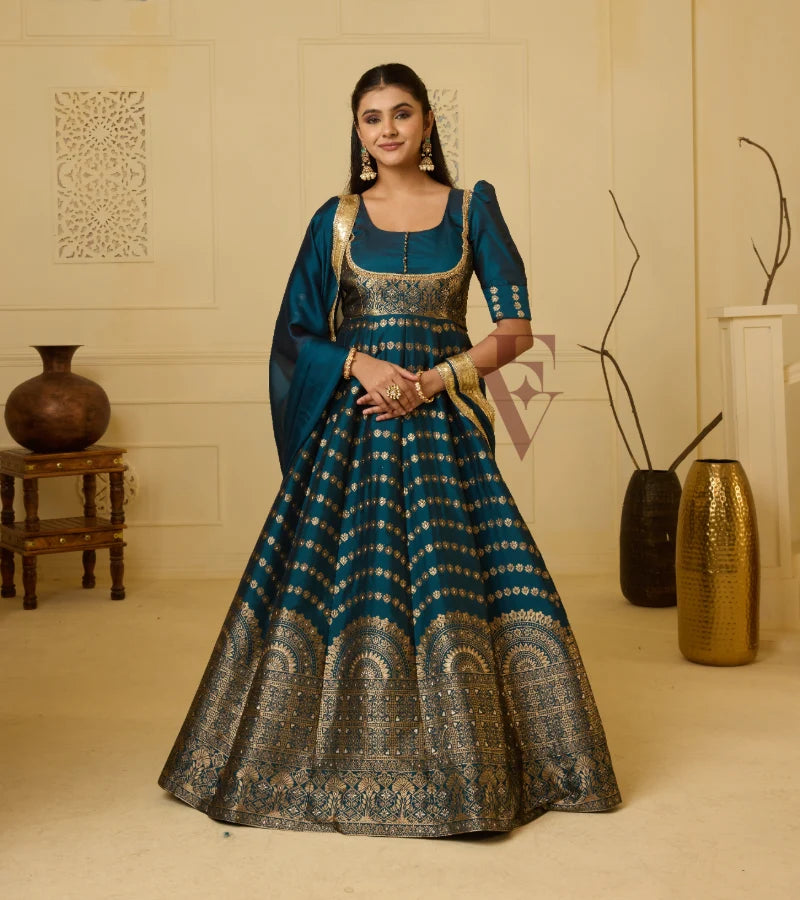 A rich peacock blue Banarasi silk gown