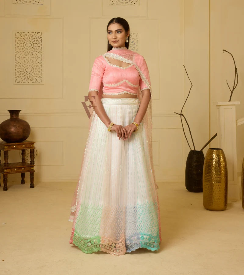 A stunning off-white and multi-color lehenga