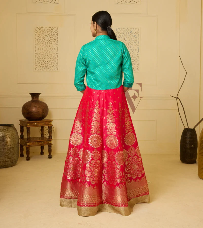 A deep pink Banarasi silk gown
