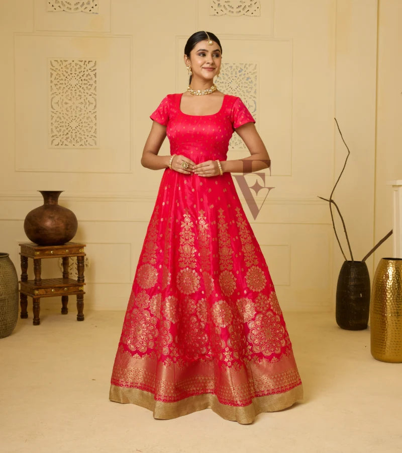 A deep pink Banarasi silk gown
